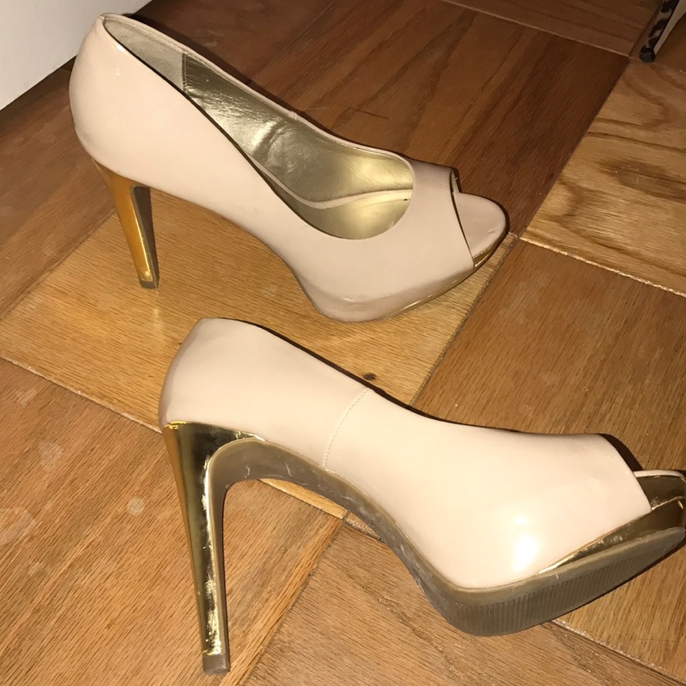 Beige and gold platforms